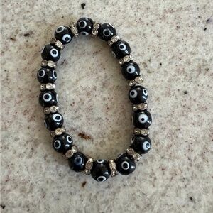 Black evil eye stretchy beaded bracelet